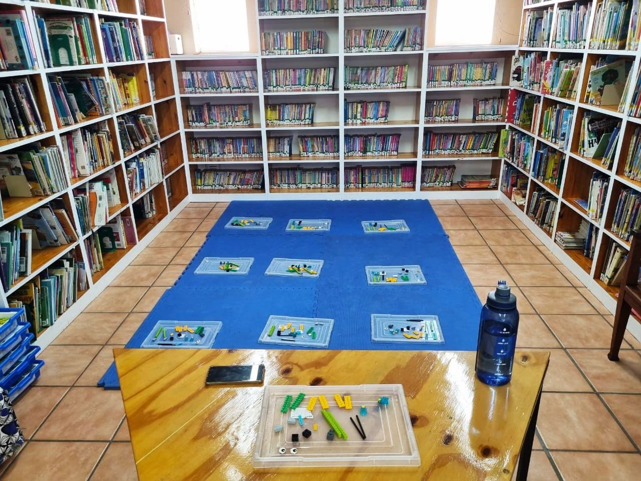 STEM classroom session with children working on robotics kits