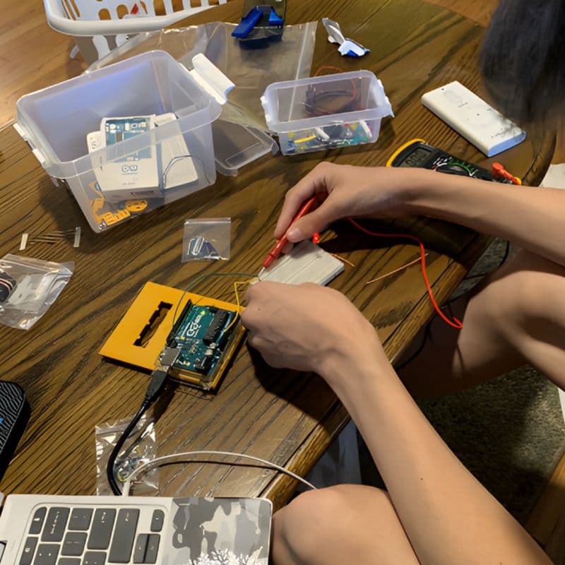 Teenager homeschooling with the Arduino Student Kit