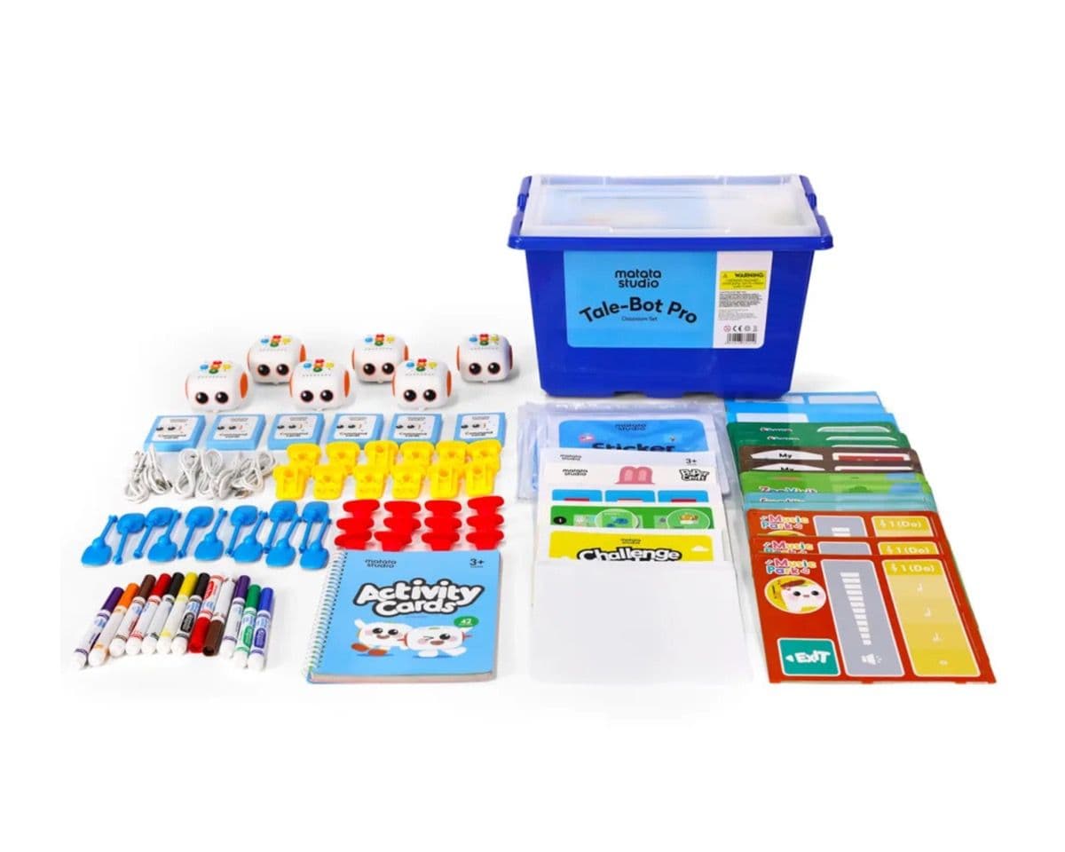 Tale-Bot Pro Classroom Set contents laid out showing all 6 robots and teaching materials