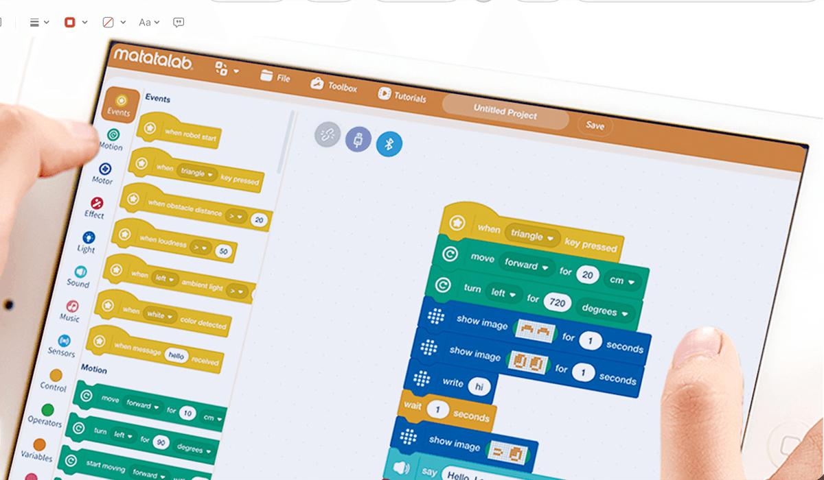 MatataCode programming interface showing block-based coding on tablet