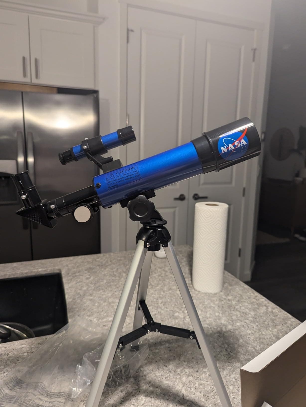 NASA Lunar Telescope set up on a counter indoors