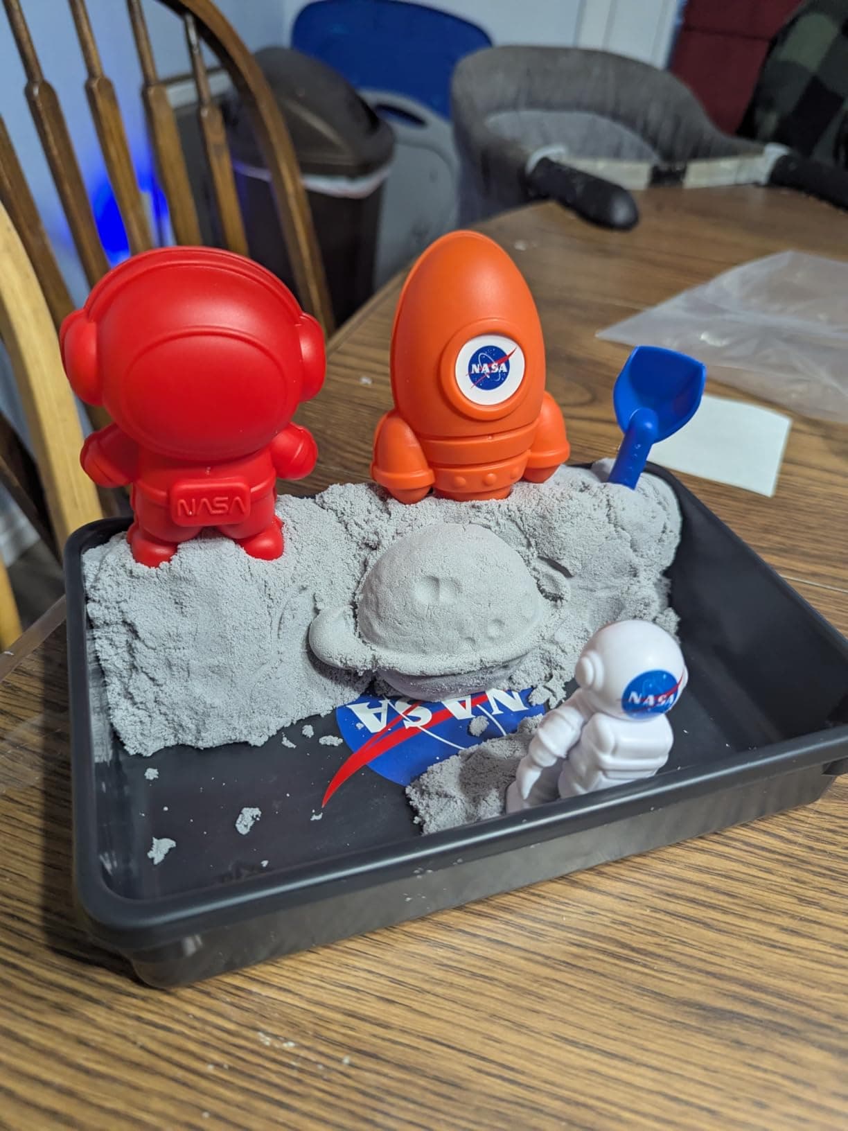 Moon sand shaped using the space molds