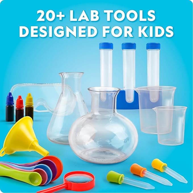 National Geographic Junior Chemistry Lab Kit: 20+ lab tools laid out including flasks, beakers, test tubes, droppers, and measuring spoons