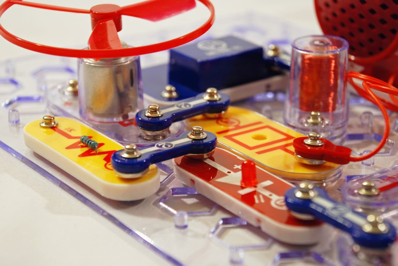 Close-up of a Snap Circuits board with components snapped in place