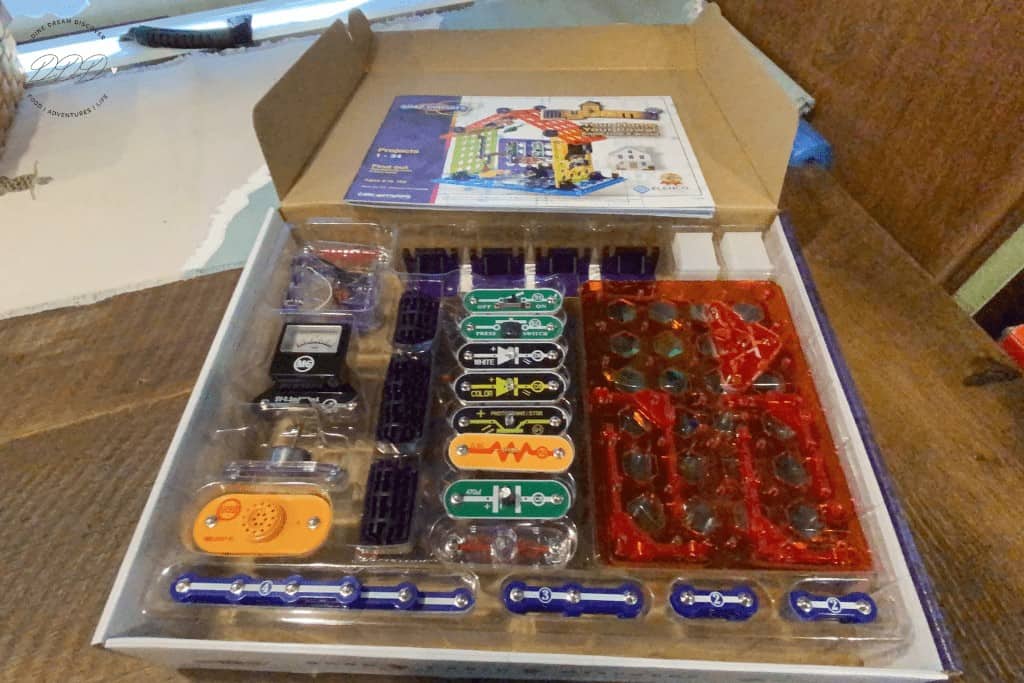 Snap Circuits My Home box open showing contents